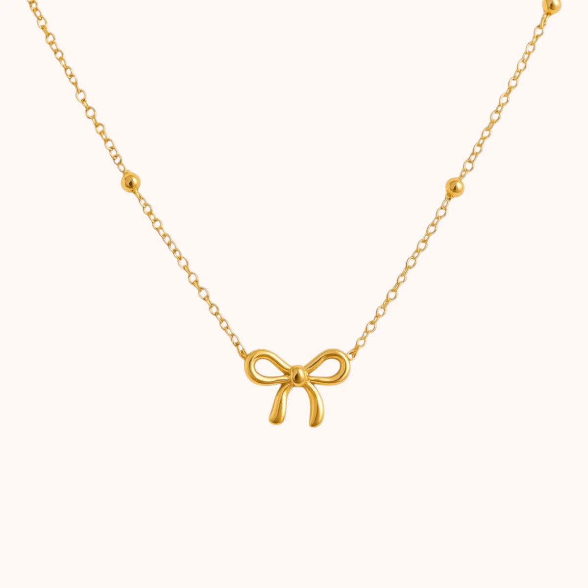 18kt Gold Plated Bead Chain Bow Charm Necklace - Manoune JEWELRY Belly_Jewelry Earrings - Navel_Ring - Necklace - Stud - Manoune_Jewelry - Belly_Ring - Navel_Jewelry Titanium Gold_Plated